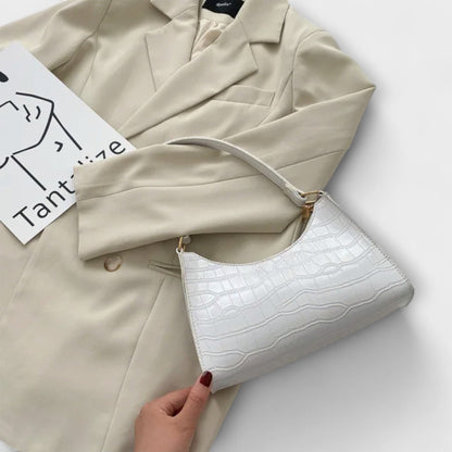 Lora. - Skinnende Lædertaske